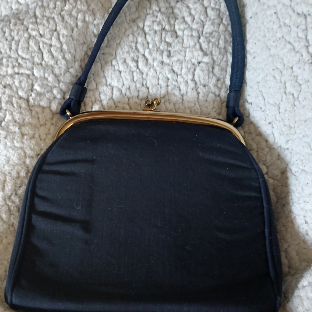 Vintage-Inspired Black Shoulder Bag with Gold Frame